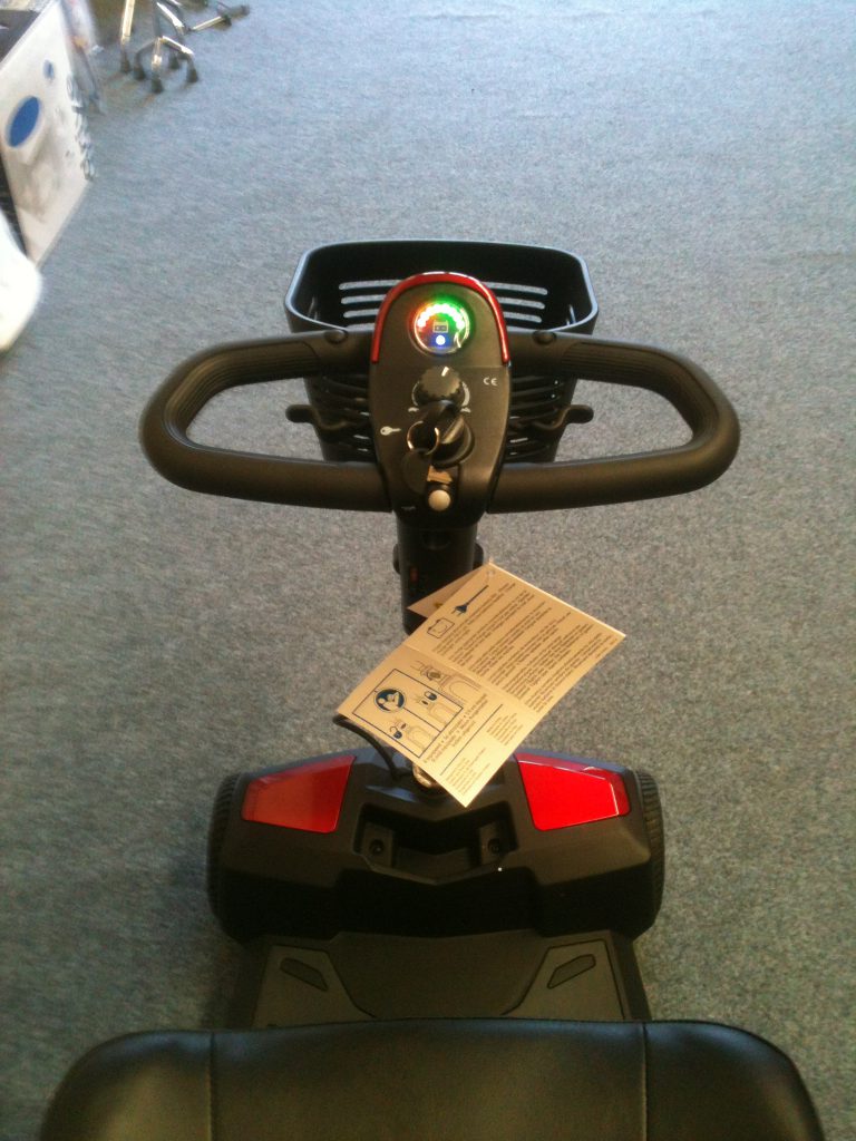 Pride Mobility Apex Rapid showing controls and dash layout