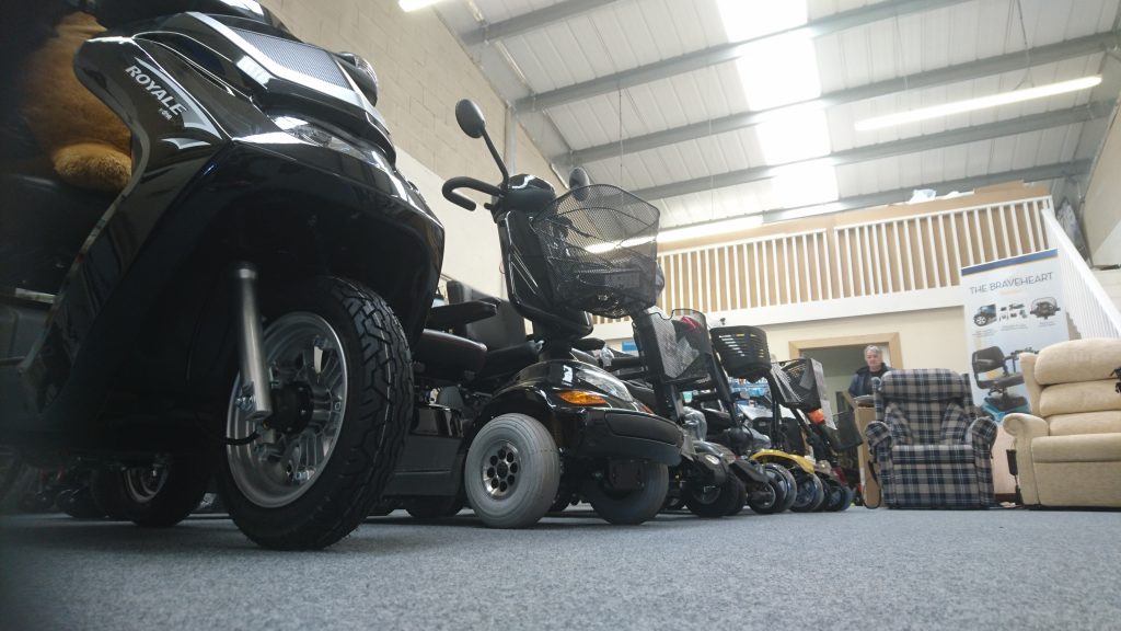Range of scooters on display in showroom 
